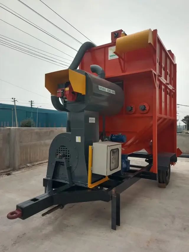 Trolley-mounted Shomas mobile grain dryer with electrical control panel