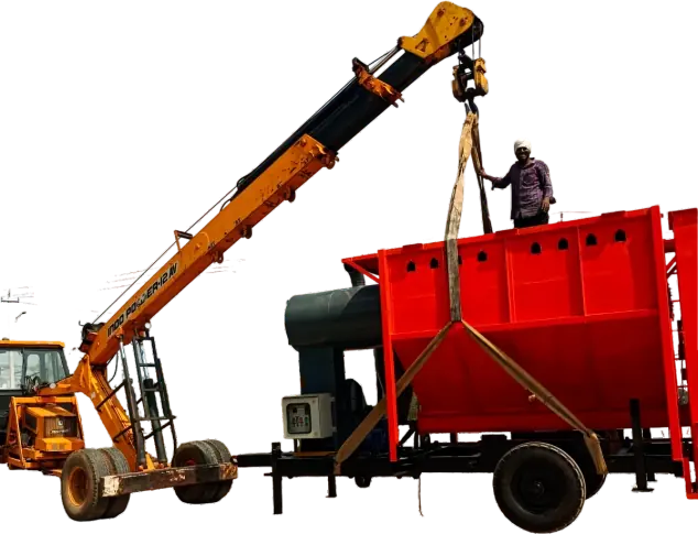 Crane loading a Shomas mobile grain dryer for dispatch